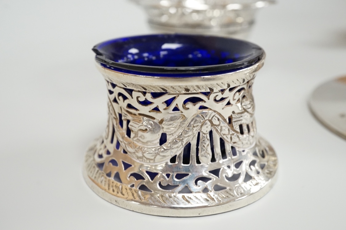 A George V silver mounted capstan inkwell, A & J Zimmerman Ltd, Birmingham, 1913, diameter 11.4cm, together with a small silver bowl, a small silver 'dish ring' salt(a.f.), a silver two handled bowl, a silver pill box an